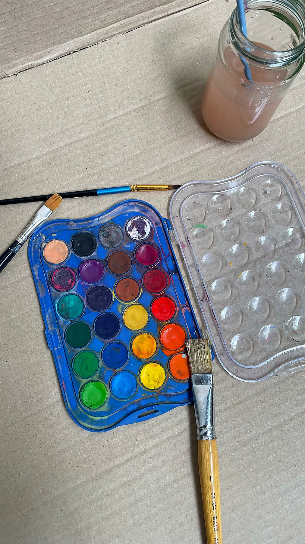 A well-loved watercolor palette and brushes